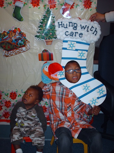 Two boys posing for pictures